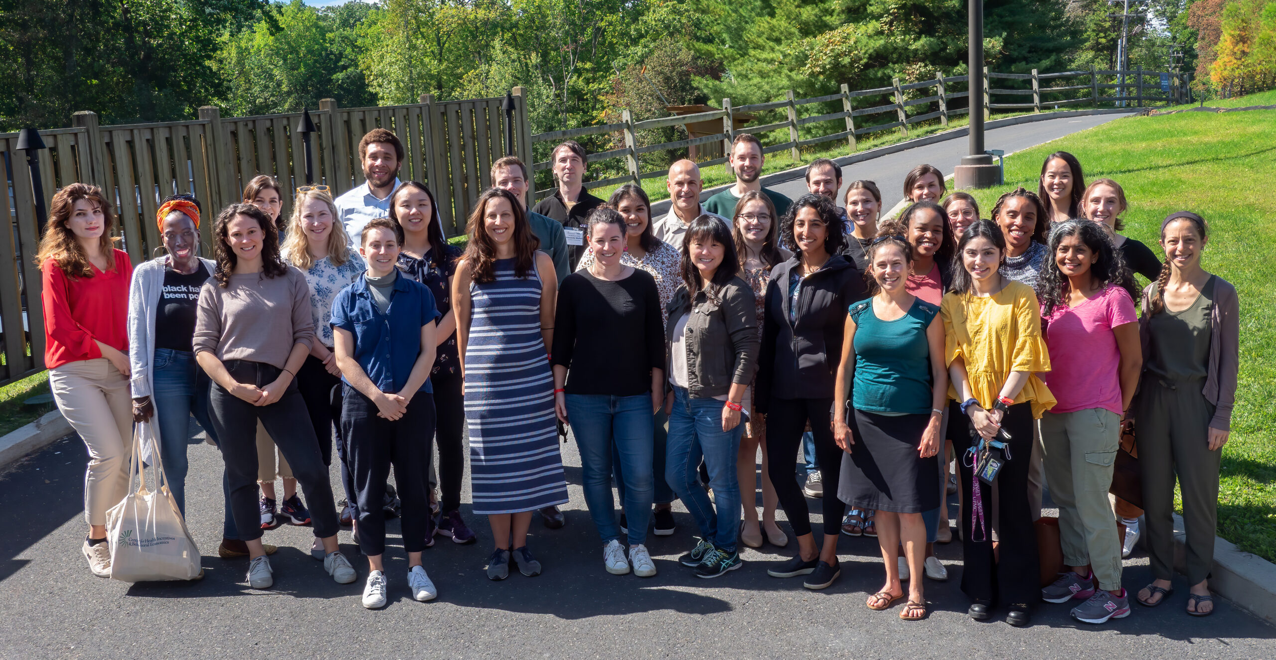 Thirty PAIR faculty, trainees, and staff pose for a group photo outside at the Roybal Retreat 2022.