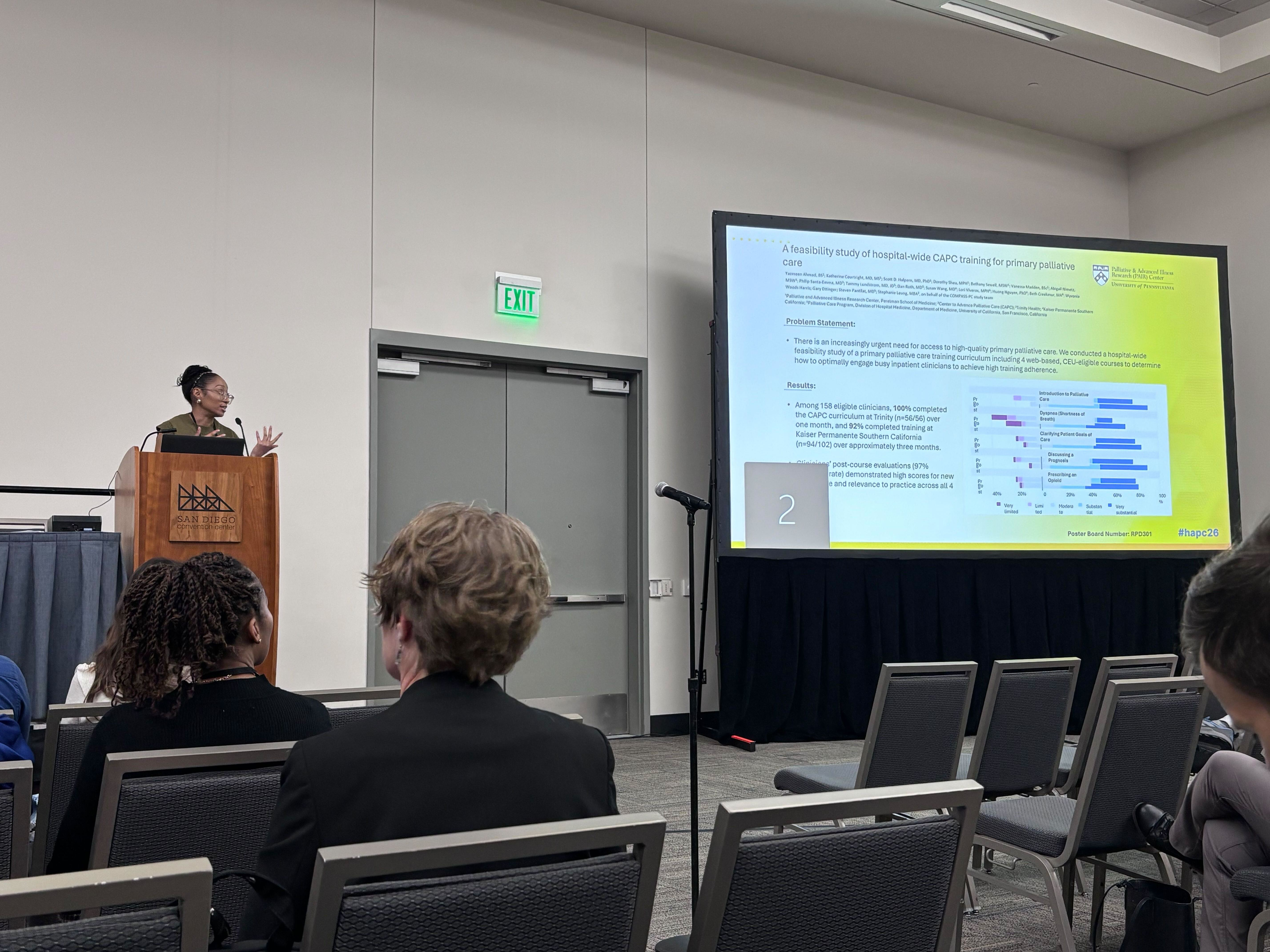 Yazzy Ahmad presenting poster during RAPiD poster session, "A Feasibility Study of Hospital-Wide CAPC Training for Primary Palliative Care."